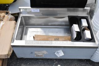 Stainless steel commercial ice bin with condiment trays, model PC1, includes labels and original packaging, gently used.