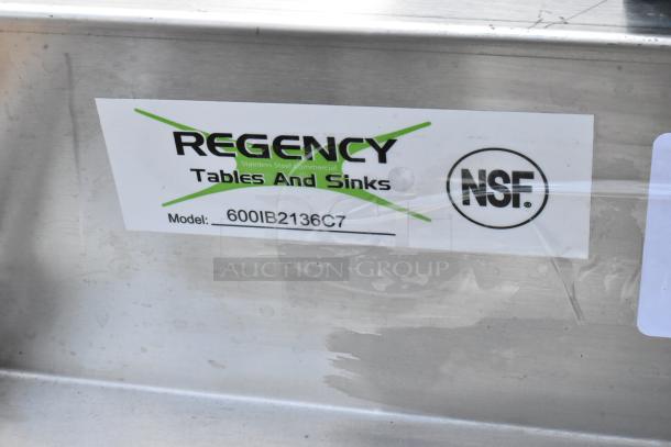 Regency stainless steel commercial sink, Model 600IB2136C7, NSF certified, visible label.