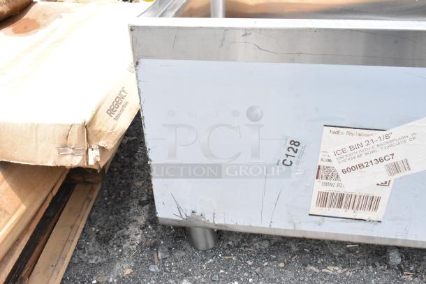 Commercial ice bin with steel construction, 21-1/8" width. Visible label with dimensions and FedEx info. Used condition.
