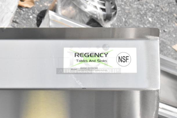 Regency stainless steel commercial table, model 600CDT60R, NSF certified, new condition with manufacturer label.