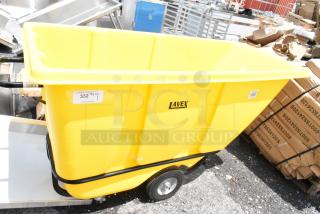 Yellow Lavex utility cart with wheels, in excellent condition. Features a capacity label and product branding.