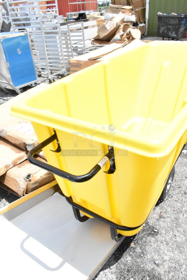 Yellow utility cart with black handles and wheels, sturdy plastic body, and visible Steelton brand label. Appears in good condition.