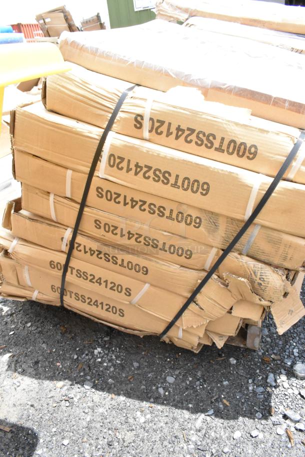 Pallet of boxed items labeled "600TSS24120S." Cardboard boxes show wear, secured with strapping.