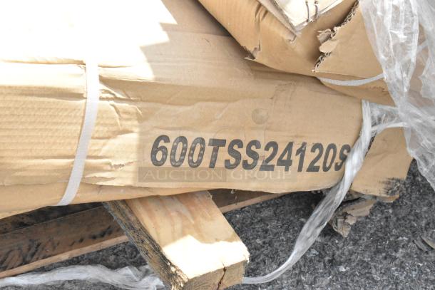 Damaged cardboard package with code "600TSS24120S," indicating potential model or batch. White straps partially visible.