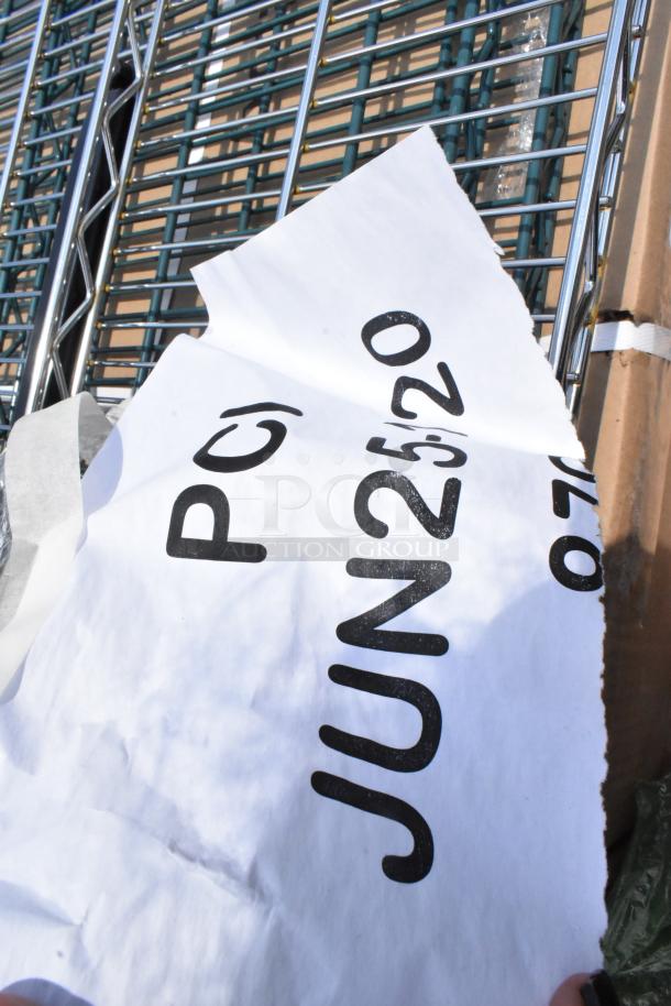 Stack of metal wire shelving units with torn paper label stating "PC, JUN 25, 20." Units appear unused, ideal for storage.
