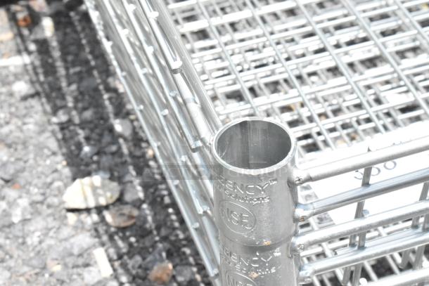 Steel wire rack corner with "NSF" and "REGENCY" markings, showcasing durable construction and polished finish.