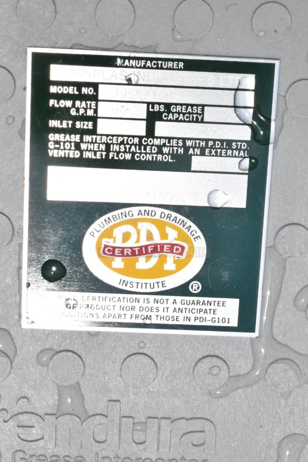Endura grease interceptor label with PDI certification, showing model number, flow rate, and compliance details.