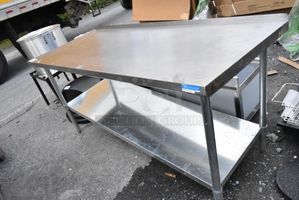 Stainless steel work table by BK Resources, model VTT-7230, in good condition, featuring a sturdy lower shelf.