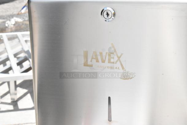 Lavex Janitorial stainless steel dispenser with key lock and mop graphic. Good condition.