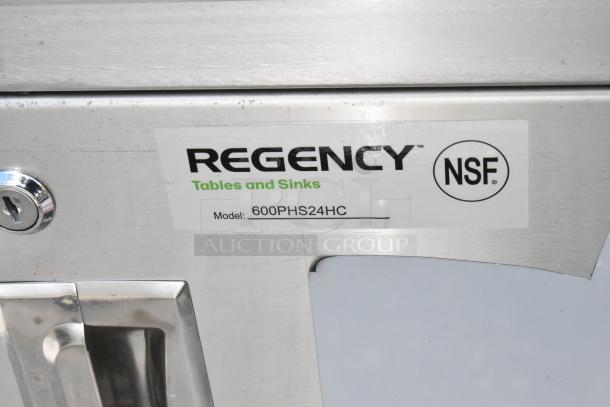 Regency stainless steel table with sink, Model 600PHS24HC. NSF-certified, visible manufacturer's label, excellent condition.