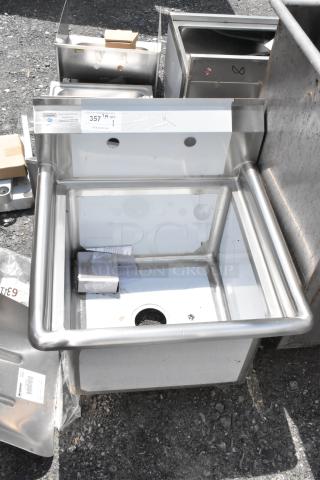 Stainless steel utility sink with attached backsplash, new condition, includes manufacturer label indicating model and quantity.