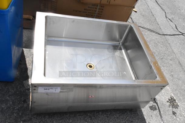 Stainless steel sink, drop-in style, with a drainage hole and visible dents. A label shows "362" and "QTY 1." Suitable for commercial use.