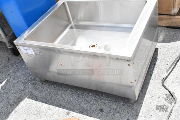 Stainless steel sink with drain, industrial-grade, lightly used, tag indicates item number 36214, durable construction.