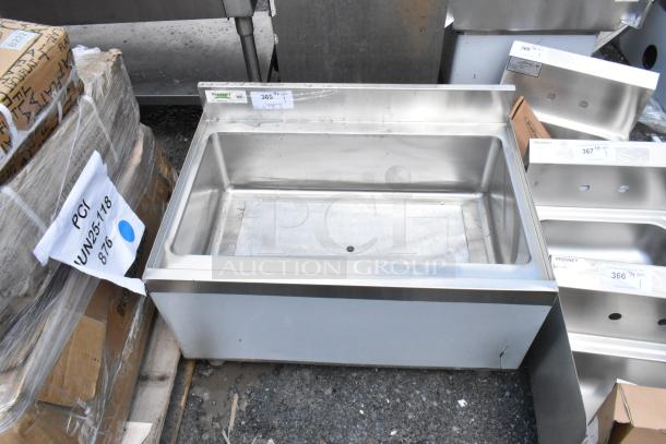 Stainless steel commercial sink, Regency brand, new condition, item number 365, displayed on a pallet with packaging.