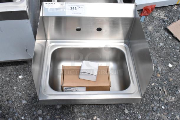 Stainless steel Regency hand sink, new condition with wall mount holes, includes faucet box, model 600HS7STSP.