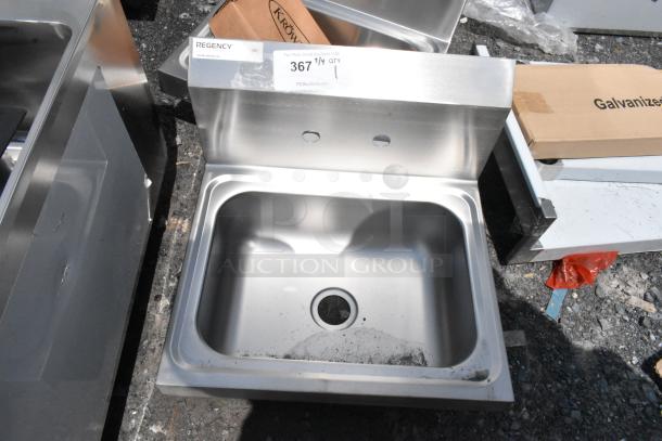 Regency stainless steel sink, model HS-1410, new condition, with two pre-drilled faucet holes, auction tag 367, NSF certified.