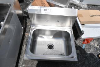 Regency stainless steel sink, model HS-1410, new condition, with two pre-drilled faucet holes, auction tag 367, NSF certified.