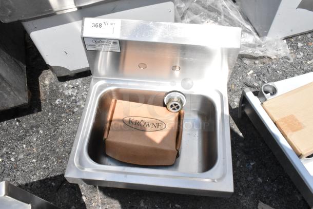 Krowne stainless steel handwashing sink, new, with drain assembly. Tag indicates quantity 368 1/4.