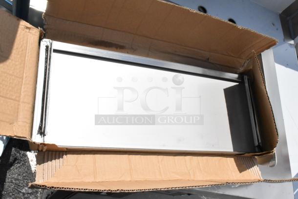 Stainless steel drawer panel in open box, new condition, smooth surface, suitable for kitchen or cabinetry.