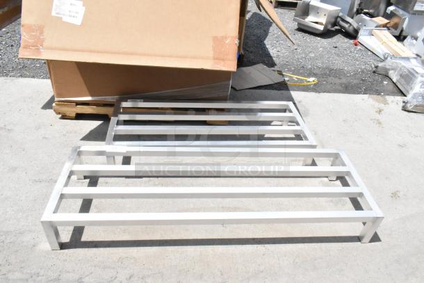 Aluminum industrial platforms, used, in good condition, rectangular frame, visible factory label, ideal for heavy-duty use.