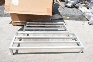 Aluminum industrial platforms, used, in good condition, rectangular frame, visible factory label, ideal for heavy-duty use.