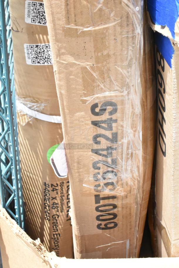 Cardboard box labeled “Space Solutions 24x48 Green Epoxy.” Features QR code and product number #406ES2448. Box intact.