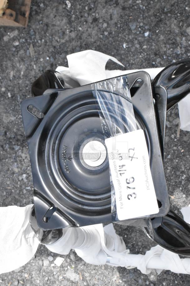 Black metal swivel base marked "Front Top," labeled "316 X2," indicating quantity for auction.