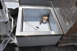 Stainless steel commercial sink, new condition, includes installation brackets and drain. Label with "377" marking.