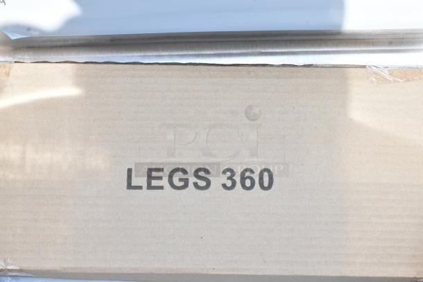 Cardboard box labeled "LEGS 360," indicating possibly furniture components; condition appears new with intact packaging.