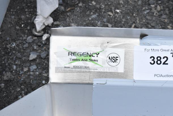Regency stainless steel sink, Model 600CDT36R, with NSF certification label, in new condition.