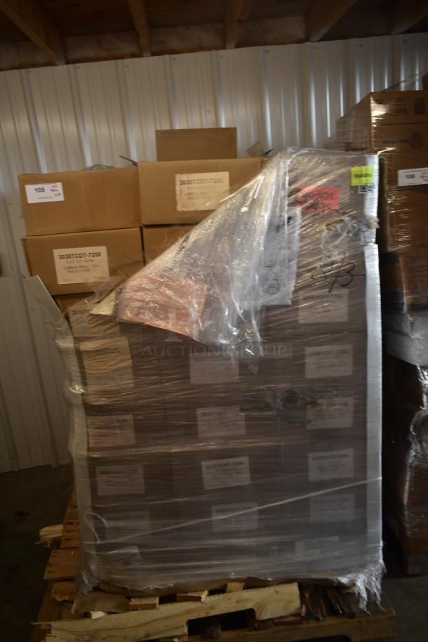 Pallet of boxed items wrapped in plastic, labeled "3030TCDT-7250." Boxes appear new. Visible markings include "105," "TVT Gain."