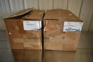 Two boxes of Choice full-size foil steam table pans, labels indicate medium gauge, boxes visibly worn.