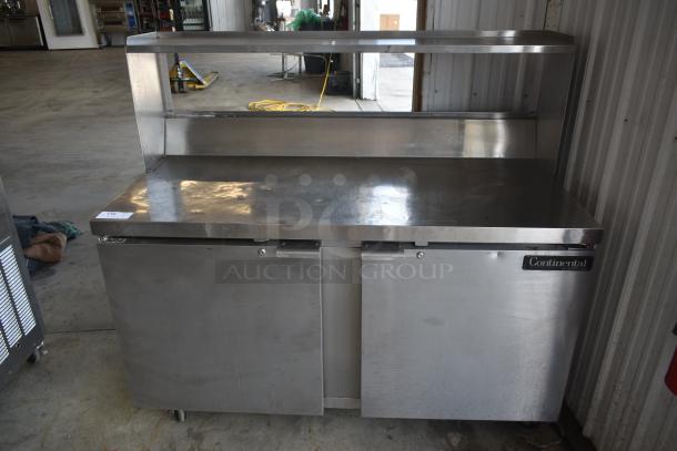 Stainless steel Continental refrigerated prep table with double doors and upper shelf, good condition, item tag "110" visible.