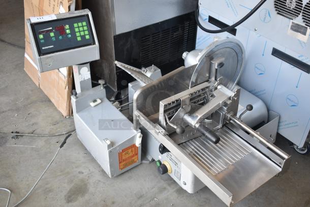 Bizerba electric meat slicer with digital controls, stainless steel blade, and operational buttons; good condition.