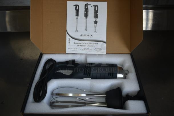 Avamix immersion blender set in box, includes motor, attachments, and power cord. Commercial variable speed, new condition.