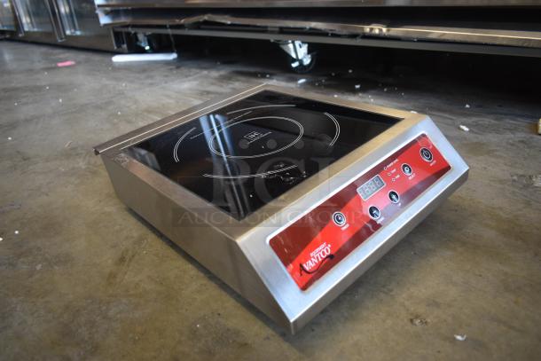 Avantco induction cooktop, stainless steel, digital display, touch controls, good condition, minor surface wear.