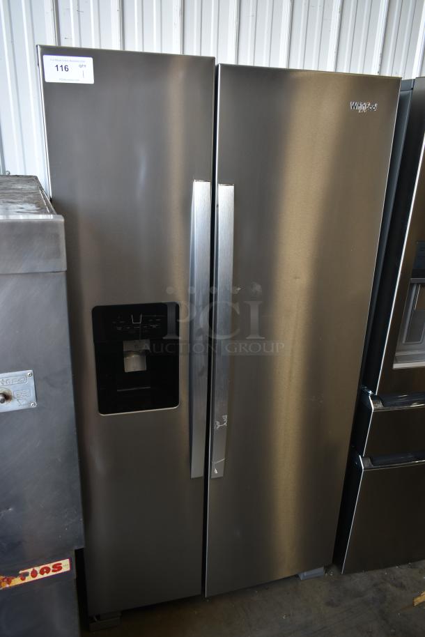 Whirlpool side-by-side stainless steel refrigerator with water and ice dispenser, auction tag reading "116". Good condition.