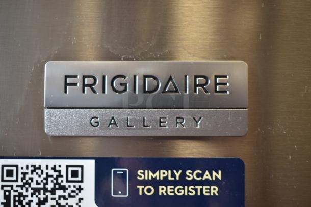 Frigidaire Gallery appliance label with QR code for registration. Stainless steel finish, modern design, new condition.