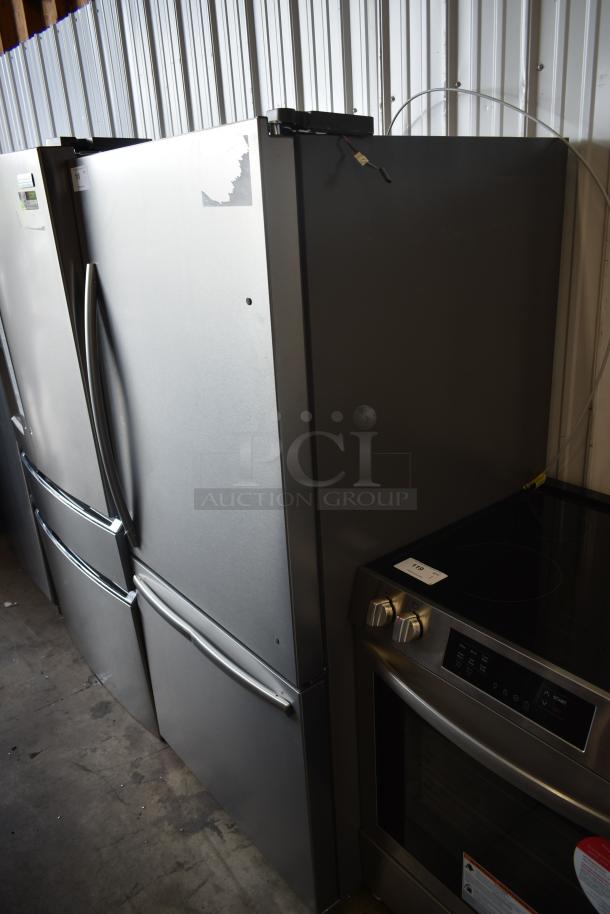 Stainless steel french door refrigerator; good condition, visible energy guide label, with adjacent electric range.