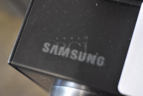 Samsung branded box, black, with visible logo on the side. Box appears in good condition.