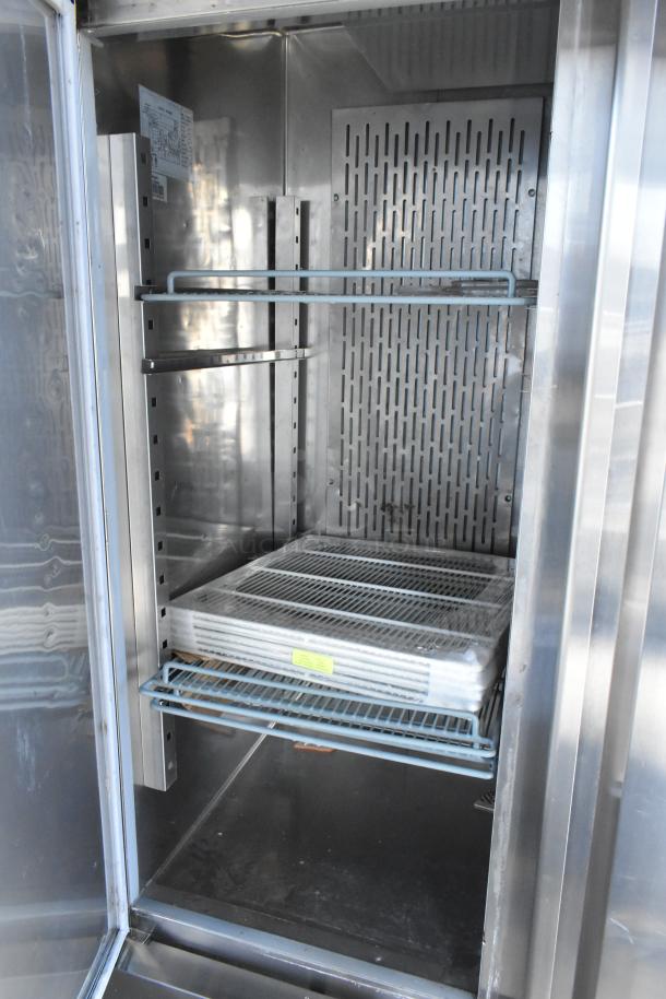 LIKE NEW! Avantco 178CFD2FF Stainless Steel Commercial 2 Door Reach In Freezer w/ Poly Coated Racks on Commercial Casters. 115 Volts, 1 Phase. - Image 14 of 17