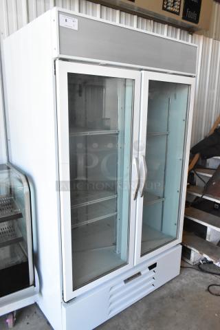 LIKE NEW! Beverage Air MMR44HC-1-W Metal Commercial 2 Door Reach In Cooler Merchandiser w/ Poly Coated Racks. 115 Volts, 1 Phase.