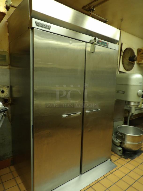 Hobart Model HBP2 2-Door Roll In Proofer Box, Room For (2) Single Racks, Equipped With Digital Temp, Humidity and Timer Controls. 89-3⁄8"H x 35-3⁄8"D” x 60"W, 208-240Volt 60Hz 1PH 20AMP 800lbs **Racks not included, for demonstration only** - Image 1 of 7