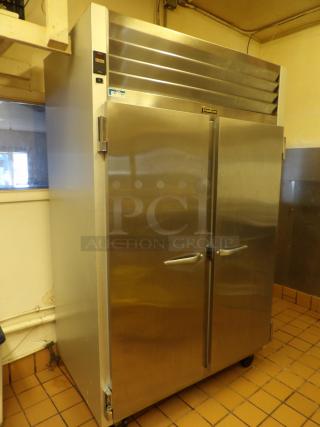 Traulsen G22010 Stainless Steel Commercial 2 Door Reach In Cooler on Commercial Casters. 115 Volts, 1 Phase. Tested and Working!