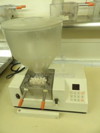 Edhard (Power Unit) filling machine for donuts, Model MKS, with User & Parts Manual