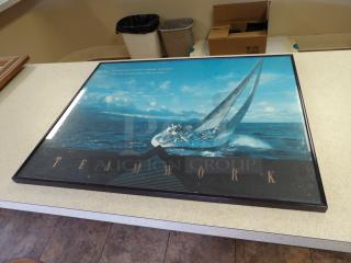 Framed "Teamwork" motivational poster featuring a sailboat, ocean scene, and inspirational quote. In good condition.