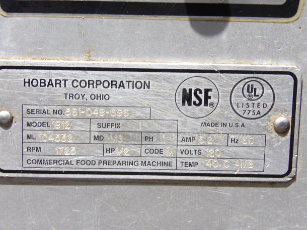 Hobart Corporation commercial food preparing machine label with model 1912, serial 561-049-696, 1/2 HP, 120V, RPM 1725.