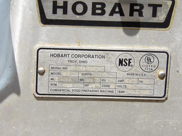 Hobart commercial food preparing machine label, Model 1912, Serial No. 561-049-696, 120 volts, 6.2 amps, NSF and UL certified.