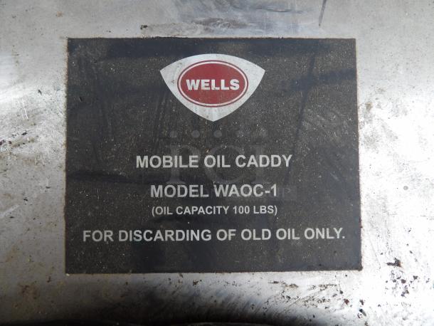 Wells Mobile Oil Caddy, Model WAOC-1, 100 lbs capacity. Used for discarding old oil.
