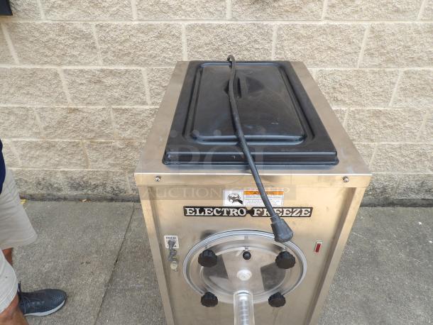 Electro Freeze ice cream machine, stainless steel, front label, rubber cord, good condition, auction item.